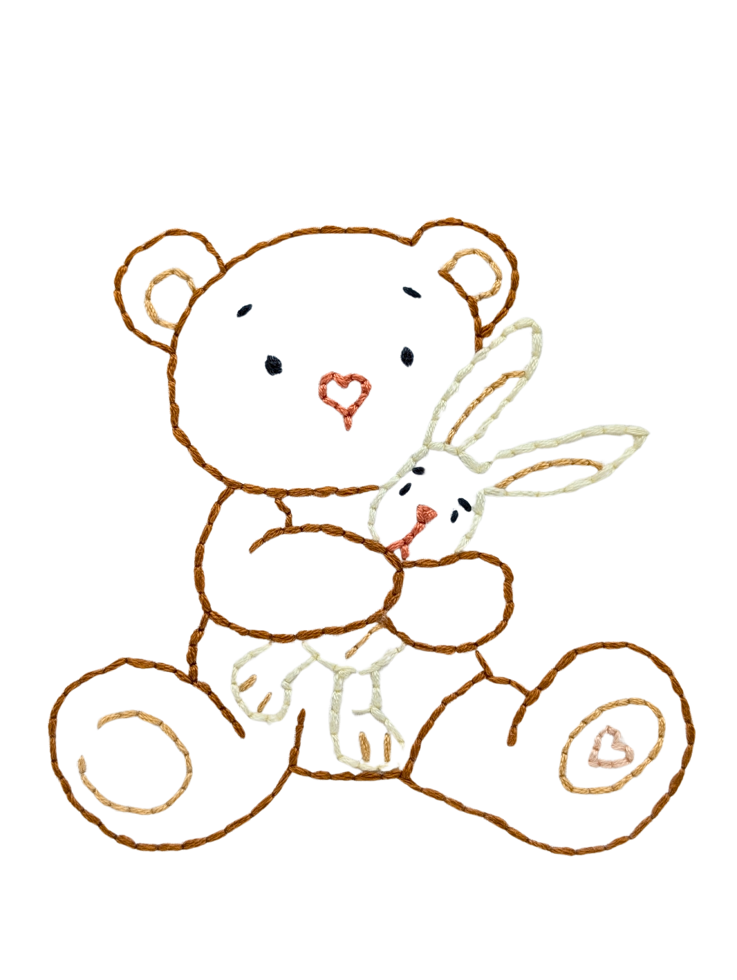 Cadre brodé Petit ourson et son doudou